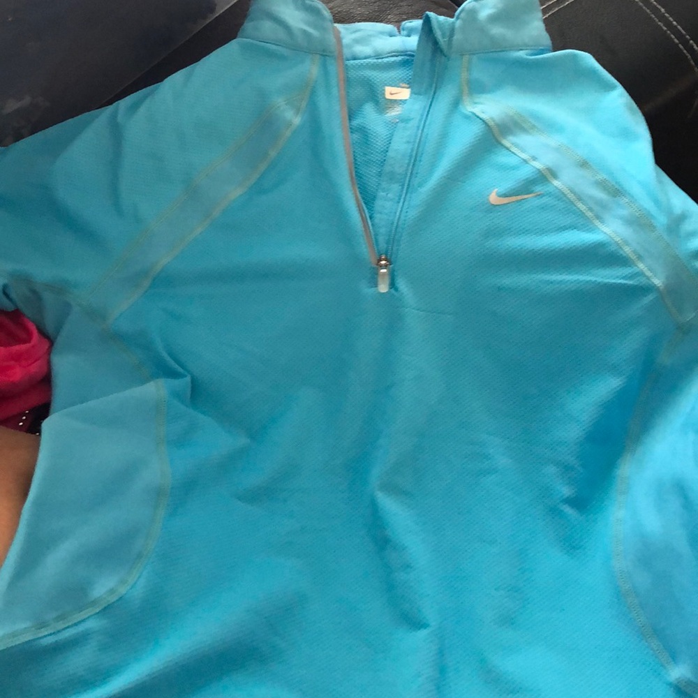 A blue nike shirt